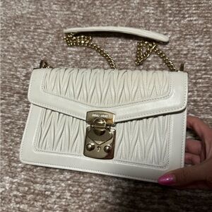 Miu Miu Confidential matelassé crossbody bag